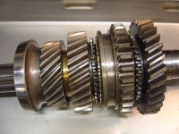  first gear (new one) now refitted (far right) and so mainshaft re-assembly now complete